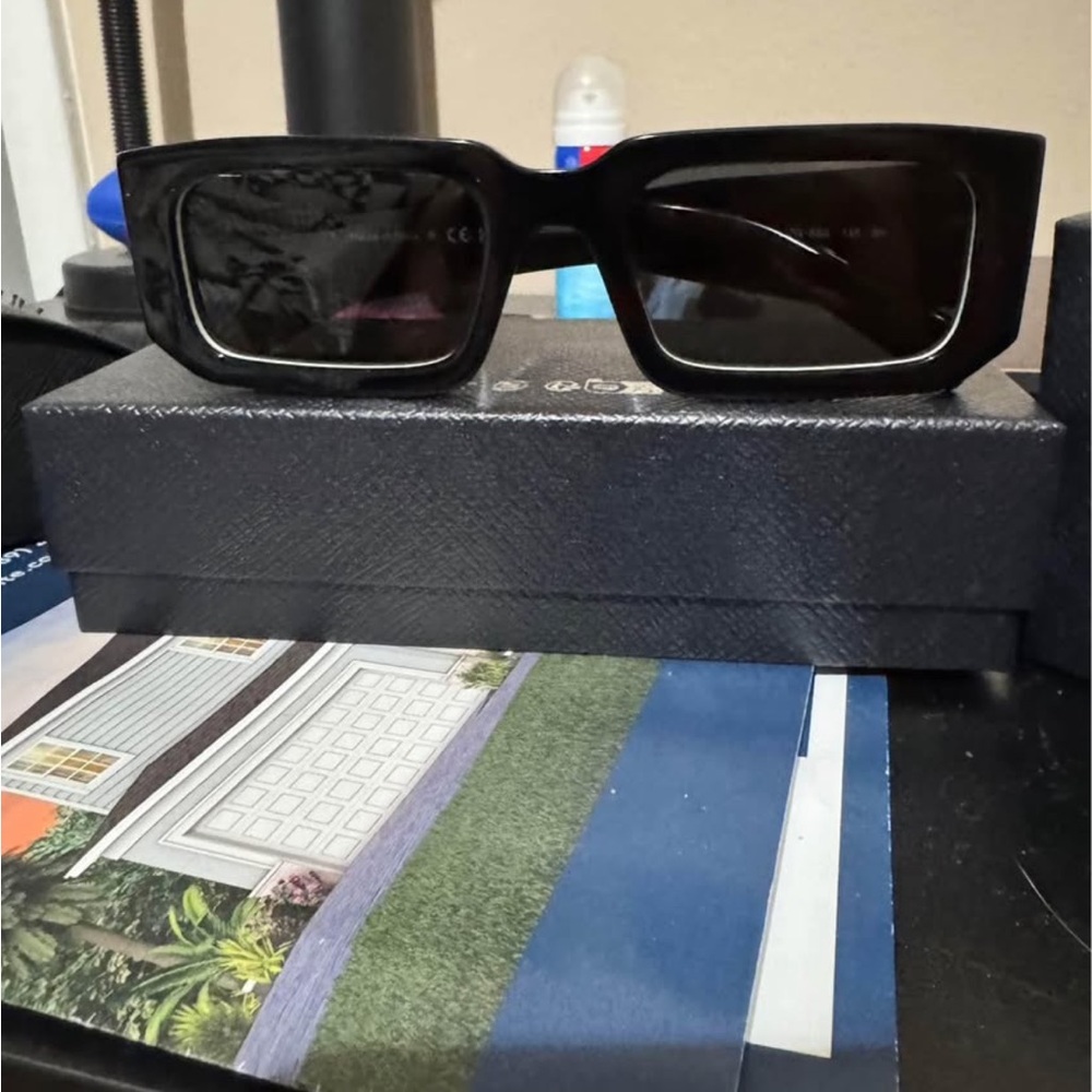 Prada Black Sunglasses with Thick Frame and Dark Lenses